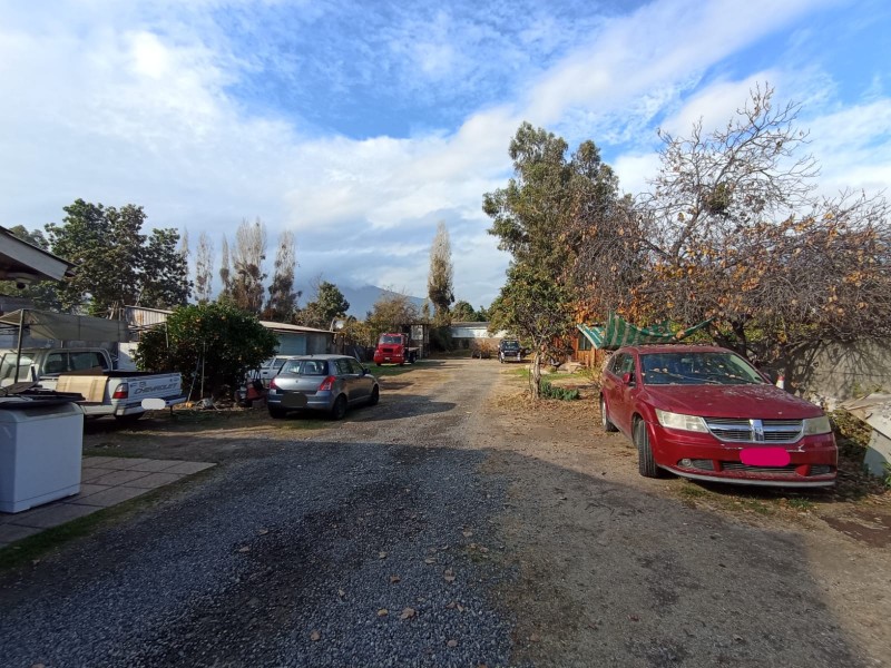 Terreno 1370M2 Con Casa, Galpon, Oficina y Canal de Regadio