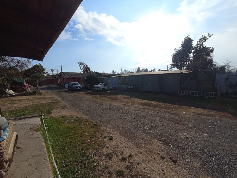 Terreno 1370M2 Con Casa, Galpon, Oficina y Canal de Regadio
