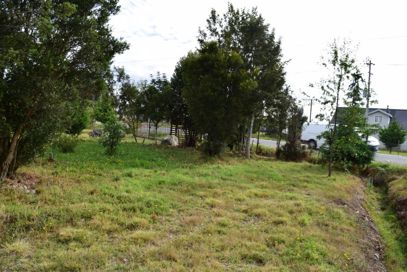 Panitao Casa y Terreno Orilla de Carretera.-