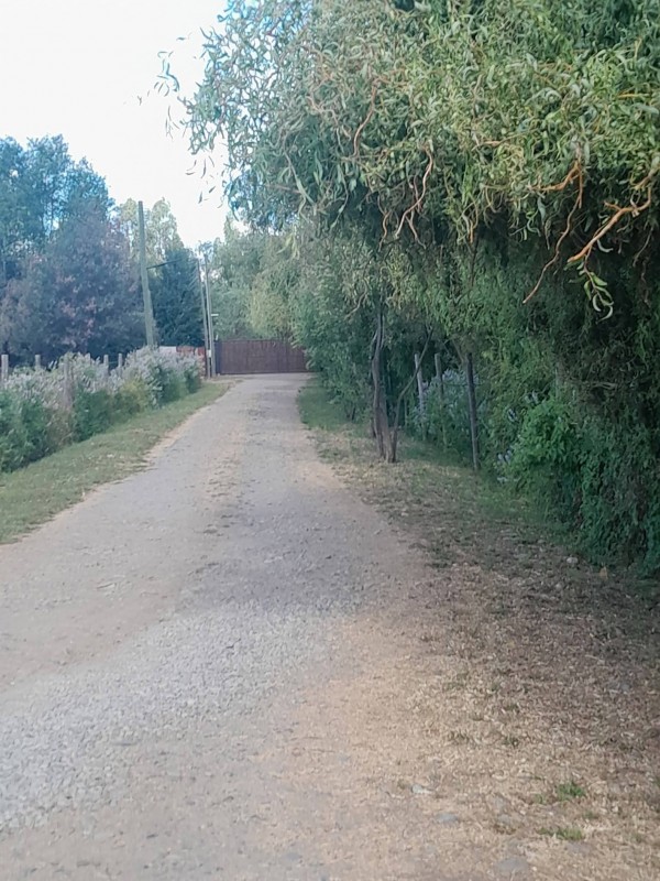Venta de Parcela Con Casa
