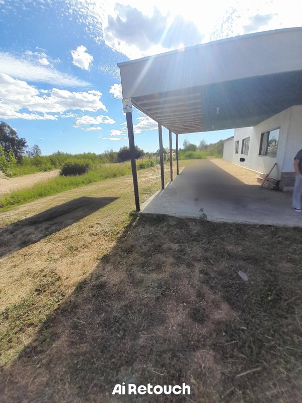 Venta de Parcela Con Casa