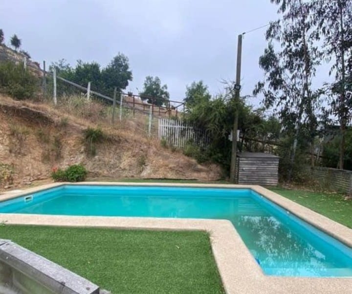 Fotografía de Se Vende Parcela Con Casa y Piscina en Casablanca