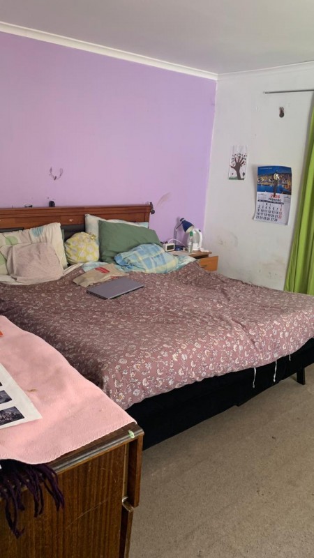 Oportunidad de Inversión, Casa de Dos Pisos en Cerro Yungay