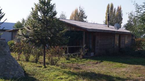 parcela agrícola de 1/2 hectárea con casa en Linares
