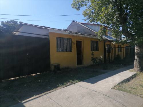 Casa con Amplio Terreno en Poblacion Aurora de Chile